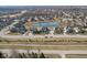 Aerial view of homes on a cul-de-sac street, backing up to a pond at 5955 Stroup Dr, Noblesville, IN 46062