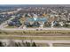 This aerial view highlights the home's location, situated near a serene pond within a desirable neighborhood at 5955 Stroup Dr, Noblesville, IN 46062