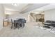 Spacious basement featuring living and dining areas with neutral tones and modern lighting at 5955 Stroup Dr, Noblesville, IN 46062
