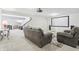 Spacious basement with projector screen, comfortable seating, and modern decor at 5955 Stroup Dr, Noblesville, IN 46062