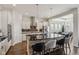 Well-equipped kitchen with stainless steel appliances, an island with seating, and a seamless design at 5955 Stroup Dr, Noblesville, IN 46062