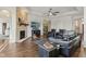 Comfortable living room with stone fireplace, flat-screen TV, and modern furnishings at 5955 Stroup Dr, Noblesville, IN 46062