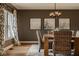Inviting dining room with a stylish chandelier and plenty of natural light at 6640 E Deerfield Dr, Zionsville, IN 46077