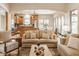 Open floor plan shows living room flowing into the kitchen and dining area, perfect for modern living at 6640 E Deerfield Dr, Zionsville, IN 46077