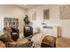 Cozy living room featuring neutral decor, a comfortable seating area, and stylish artwork on the walls at 6640 E Deerfield Dr, Zionsville, IN 46077