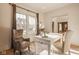 Bright home office features natural light and comfortable furnishings at 6640 E Deerfield Dr, Zionsville, IN 46077