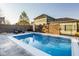 Inviting in-ground pool with a clean design and surrounding fence providing a private outdoor retreat at 6640 E Deerfield Dr, Zionsville, IN 46077
