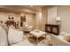 Spacious basement recreation room features a dinette, a bar area, and comfortable seating at 6640 E Deerfield Dr, Zionsville, IN 46077