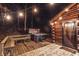 Exterior view featuring a hot tub, adjacent to the home providing relaxation at 6688 Bellsville Pike, Columbus, IN 47201