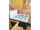 Close up of the hot tub, promising outdoor relaxation at 6688 Bellsville Pike, Columbus, IN 47201