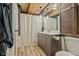 Bathroom with wood ceiling, vanity, and a shower with curtain at 7116 Grandview Rd, Columbus, IN 47201