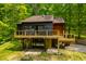 Stunning home with a deck, set amidst lush greenery at 7116 Grandview Rd, Columbus, IN 47201