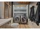 Laundry room with full sized washer and dryer and ample storage at 7116 Grandview Rd, Columbus, IN 47201