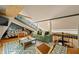 Bright living area with hardwood floors, skylights, and comfortable seating at 7116 Grandview Rd, Columbus, IN 47201