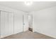 Bedroom featuring carpet flooring and ample closet space at 714 S 4Th Ave, Beech Grove, IN 46107