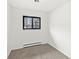 Cozy bedroom with neutral carpet and a bright window offering natural light at 714 S 4Th Ave, Beech Grove, IN 46107
