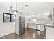 Bright kitchen with stainless steel appliances, ample cabinets, and modern fixtures at 714 S 4Th Ave, Beech Grove, IN 46107