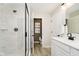 Modern bathroom featuring a walk-in shower, stylish vanity, and contemporary design, providing a spa-like experience at 7346 Shroyer Way, Noblesville, IN 46062