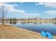 Lush backyard bordering a tranquil lake offers serene views and a peaceful escape at 7370 Chestnut Hills Blvd, Indianapolis, IN 46278