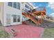 Backyard patio with stairs leading to an upper deck at 7370 Chestnut Hills Blvd, Indianapolis, IN 46278