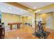 Spacious basement with multiple bikes and a pool table, providing endless possibilities for recreation and fitness at 7370 Chestnut Hills Blvd, Indianapolis, IN 46278