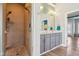 Bathroom featuring walk-in shower, double vanity, and tile floors at 7370 Chestnut Hills Blvd, Indianapolis, IN 46278