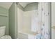 Bathroom with white tub and shower at 7370 Chestnut Hills Blvd, Indianapolis, IN 46278