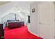 Bedroom with red carpet, ceiling fan, and bed at 7370 Chestnut Hills Blvd, Indianapolis, IN 46278