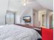 Spacious bedroom with desk, ceiling fan, and window at 7370 Chestnut Hills Blvd, Indianapolis, IN 46278