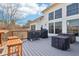 Well-equipped deck with grills, patio furniture, and a view of the backyard at 7370 Chestnut Hills Blvd, Indianapolis, IN 46278