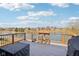 Enjoy this spacious deck featuring outdoor bar and grill, perfect for entertaining with scenic lake views at 7370 Chestnut Hills Blvd, Indianapolis, IN 46278
