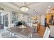 Open-concept design connects dining area to living room and kitchen, creating seamless living at 7370 Chestnut Hills Blvd, Indianapolis, IN 46278