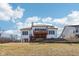 Back of the home with upper deck and ample windows at 7370 Chestnut Hills Blvd, Indianapolis, IN 46278