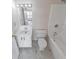 This bathroom features white fixtures, a tub, and a vanity at 7621 Orchard Village Dr, Indianapolis, IN 46217