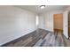 Comfortable bedroom with wood-look flooring and a closet for optimal organization at 7621 Orchard Village Dr, Indianapolis, IN 46217