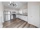 Modern kitchen featuring stainless steel appliances, granite counters and white cabinetry at 7621 Orchard Village Dr, Indianapolis, IN 46217