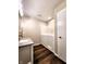 Bathroom featuring a walk in tub, hardwood floors, and a granite vanity at 8143 Filly Ln, Plainfield, IN 46168