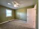 Bedroom with neutral carpet, bright window, and ceiling fan at 8143 Filly Ln, Plainfield, IN 46168