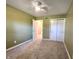 Bedroom with neutral carpet, ceiling fan, and closet at 8143 Filly Ln, Plainfield, IN 46168