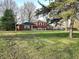 Charming two-story home with brick and siding, on a large lot with mature trees at 8143 Filly Ln, Plainfield, IN 46168