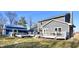 Image of backyard showcasing multiple deck levels with access to a two story home at 8513 Shelbyville Rd, Indianapolis, IN 46259