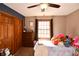 Comfortable bedroom features a closet, dresser, and a bright window at 8513 Shelbyville Rd, Indianapolis, IN 46259