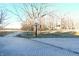 A long driveway leading to a basketball hoop at 8513 Shelbyville Rd, Indianapolis, IN 46259