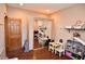 Spacious playroom with ample natural light, hardwood floors, and mirrored closet, ideal for ' activities at 8513 Shelbyville Rd, Indianapolis, IN 46259