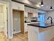 Modern kitchen area featuring a kitchen island, sleek countertops, and ample cabinet space at 922 N Oakland Ave, Indianapolis, IN 46201