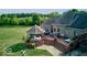Aerial view of an outdoor deck with a gazebo, patio furniture, and a grill at 9615 N County Road 150 E Rd, Pittsboro, IN 46167
