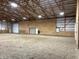 Spacious barn interior featuring a dirt floor, multiple bays, and an open layout at 9615 N County Road 150 E Rd, Pittsboro, IN 46167