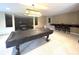 Spacious basement featuring a pool table, a bar area with seating, and recessed lighting at 9615 N County Road 150 E Rd, Pittsboro, IN 46167
