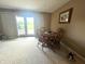 Basement dining area featuring a round table, four chairs, carpeting, and natural light at 9615 N County Road 150 E Rd, Pittsboro, IN 46167