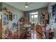 Charming dining room featuring vintage furniture, hardwood floors, and natural light at 9615 N County Road 150 E Rd, Pittsboro, IN 46167